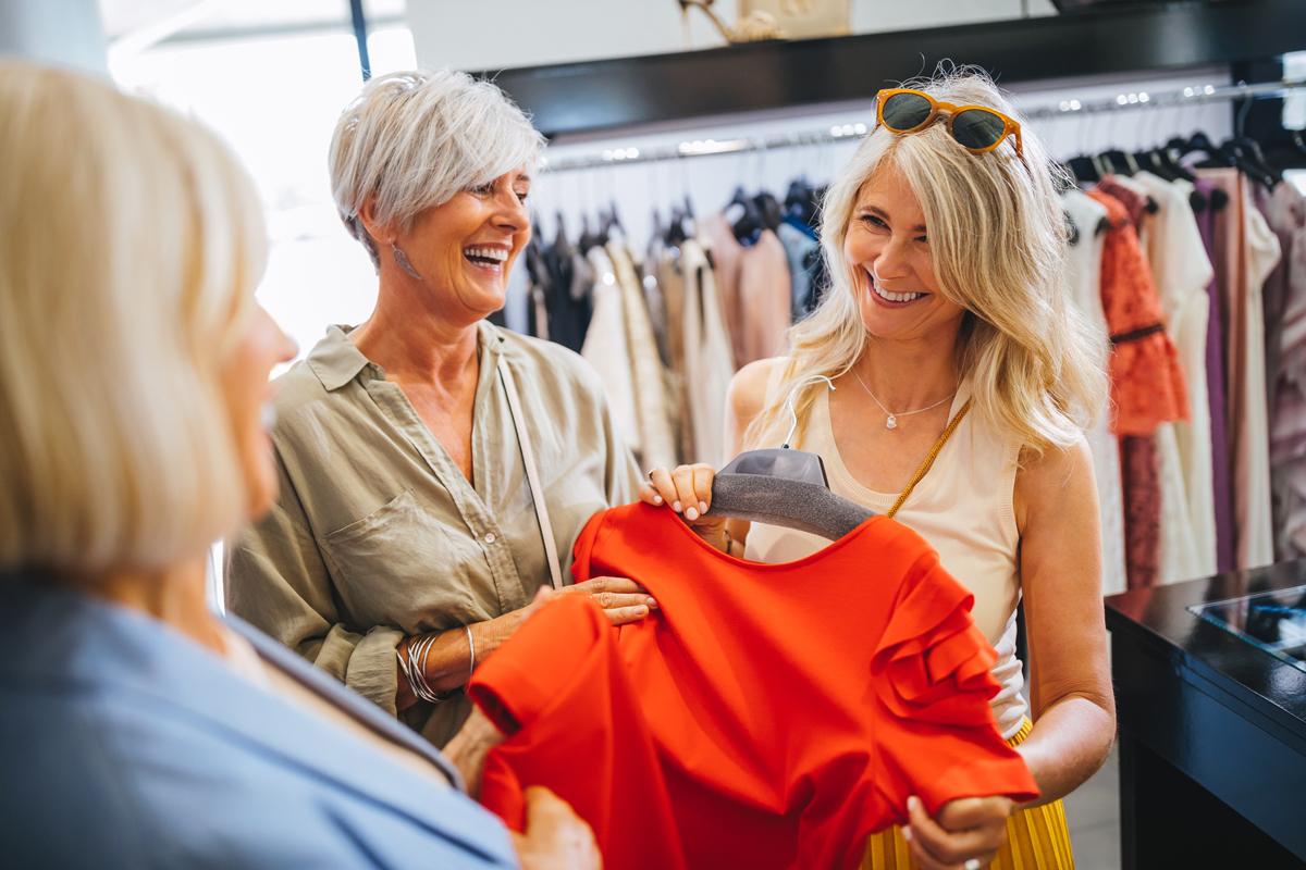 Friends shopping for a dress.